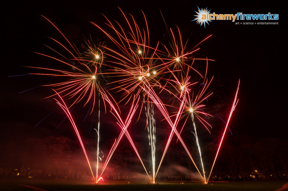 A lattice of brightly coloured fireworks in the sky at Haverhill Recreation Ground