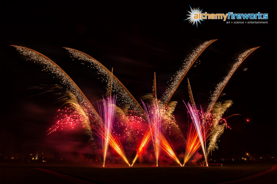 Red, pink and gold fireworks in the sky at Haverhill Recreation Ground