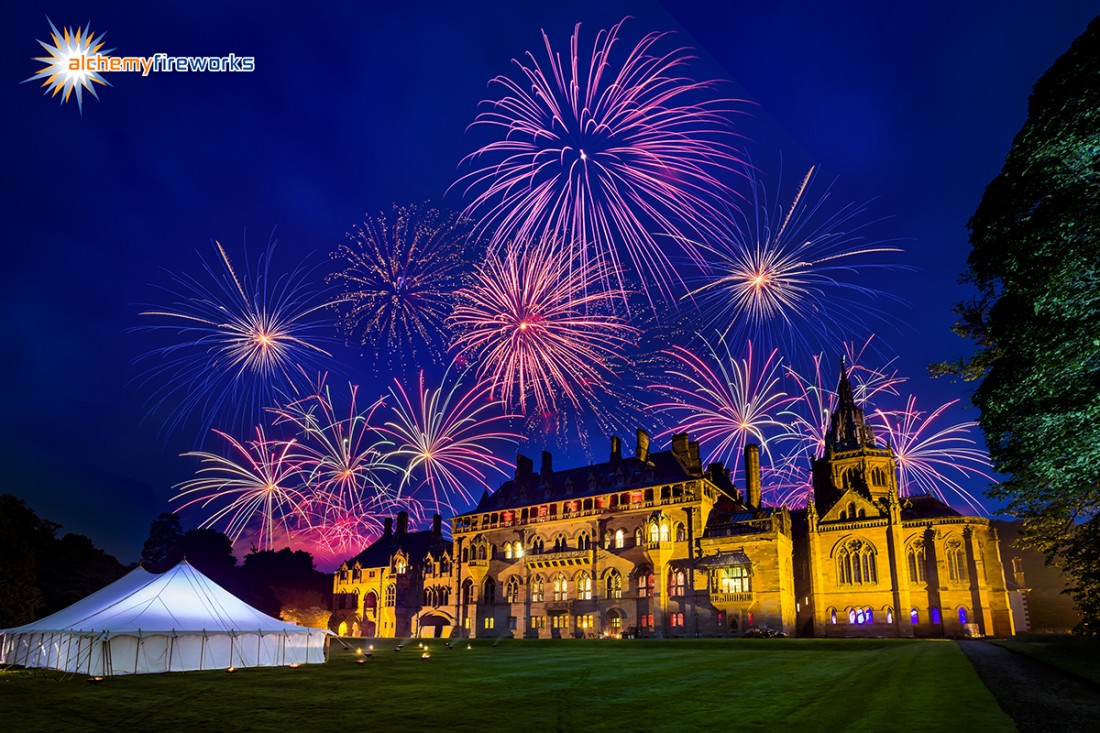 Fireworks bursting in the skies above Mount Stuart on the Isle of Bute