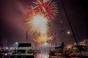 Golden Fireworks exploding over the marina for Ipswich Maritime Festival fireworks display