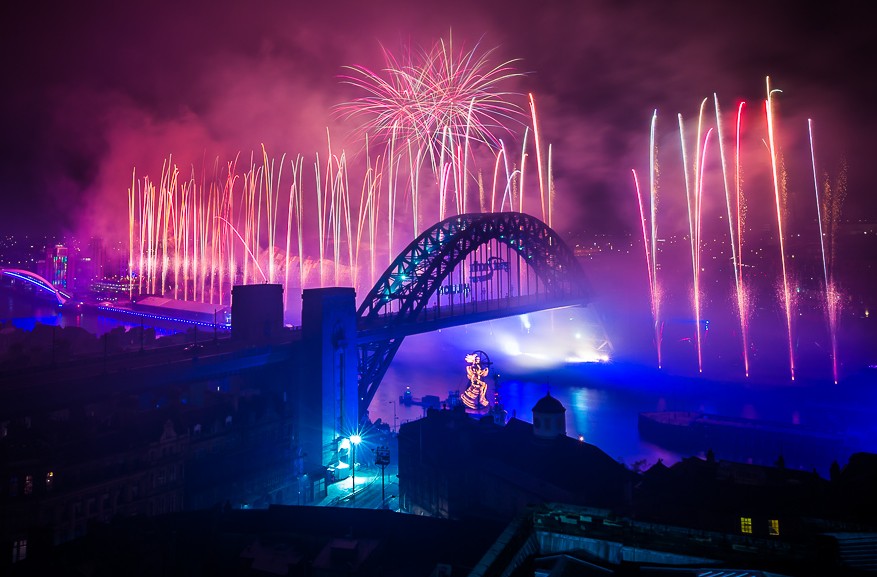 Multi coloured fireworks along the River Tyne in Newcastle City Centre