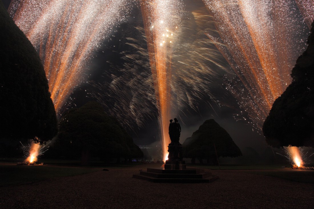 Gold and silver stardust lights up the trees at Hampton Court for a fireworks display