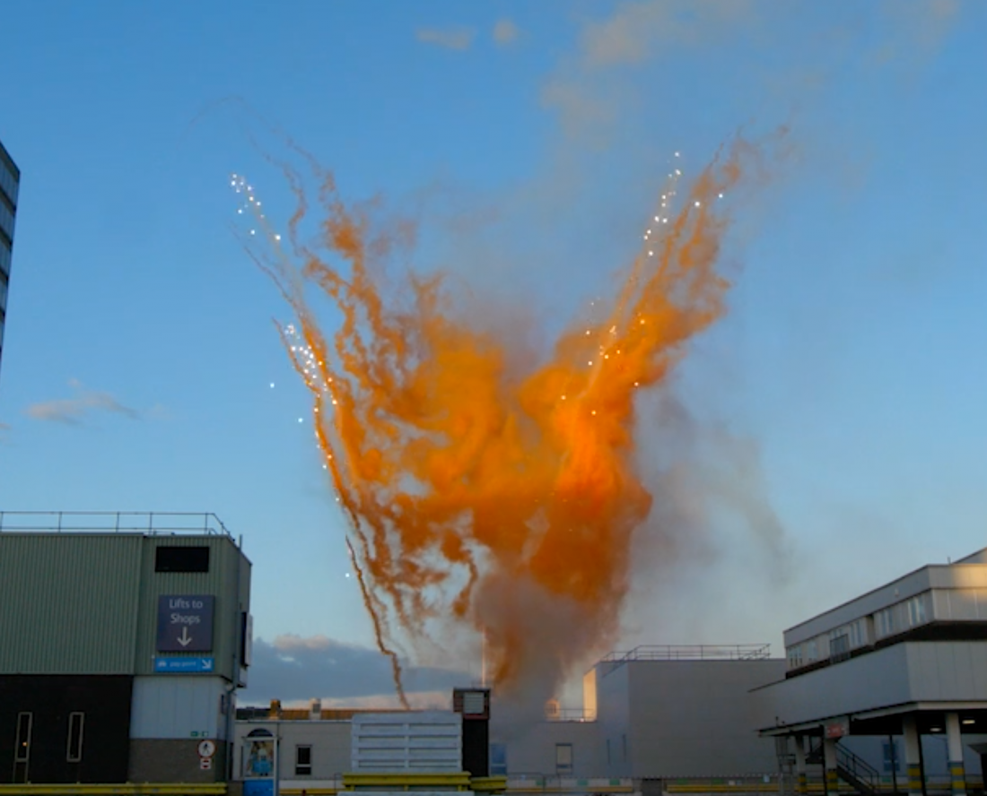 Bright orange smoke trails for a daylight fireworks display in Middlesbrough