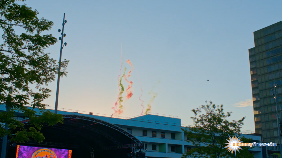 Coloured smoke trails from a rooftop in Middlesbrough